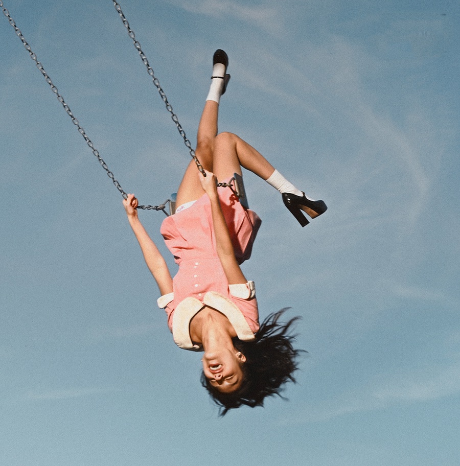 Olivia Rodrigo on a swing, from the artwork for you seem pretty sad for a girl so in love